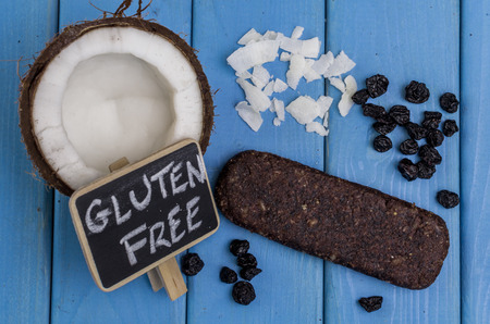 Bio gluten free protein bar with blueprints and copyspace sign.の写真素材