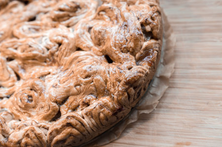 Fresh baked apple pie taken out from ovenの写真素材