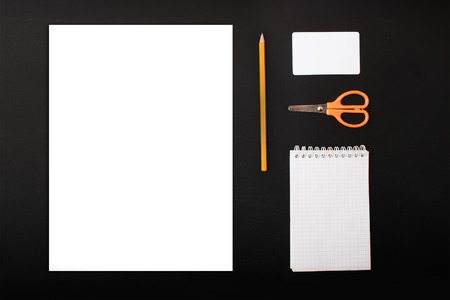 View top. Mockups on the black background. Templates blank with stationery. Flat layの写真素材