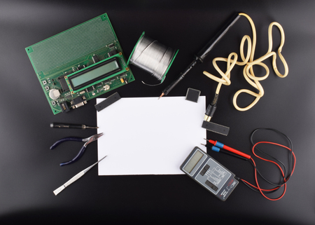 Mock up objects such as industrial controllers on a black background with copy space, top viewの写真素材
