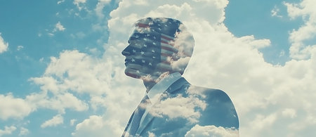 Man with usa flag against blue sky with white clouds 3dの写真素材
