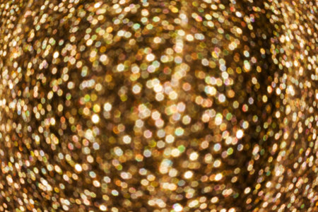 Colourful spark and blow colourful bokeh light in golden colour tone for abstract background