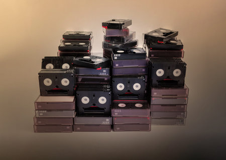 Vintage style of abandoned pile of old useless mini DV (video cassette tape)の写真素材