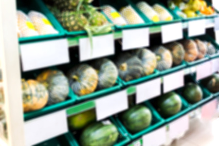 Blurred background fruits shelf in supermarketの写真素材