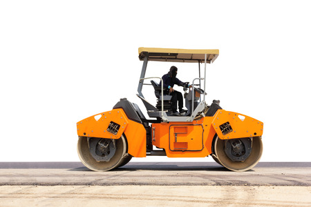 Isolated road roller; steamroller on under construction asphalt road on whiteの写真素材