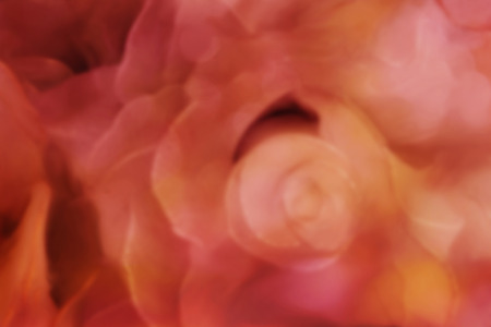 Abstract blurred background flower shape soft pastel pink orange and yellow colourの写真素材