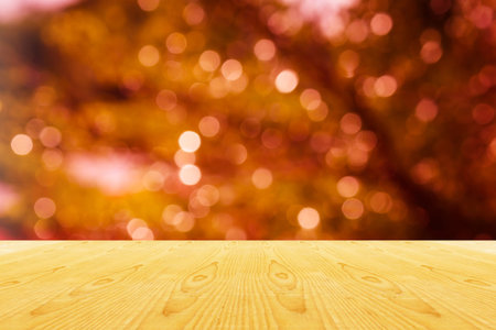 Blank area or space table top on bokeh light shining and sparkle background, wood table top for...