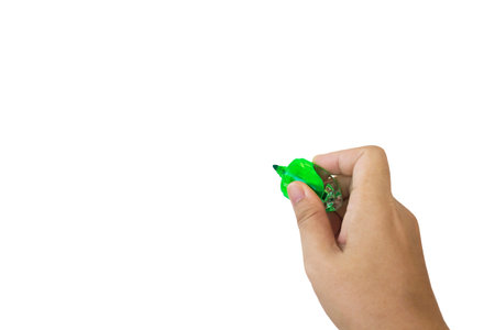 Isolated hand and marker pen writing on white backgroundの写真素材