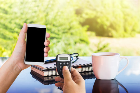 Hand hold token to generate password for online banking with blank screen smartphone or mobile for...