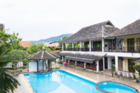 Blurred background of building and swimming poolの写真素材