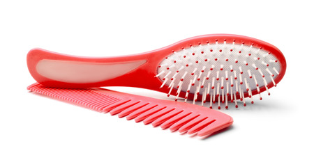 Set of comb and hairbrush isolated on white backgroundの写真素材