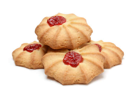 Heap of fresh shortbread cookies isolated on white. Front view, horizontal.の写真素材
