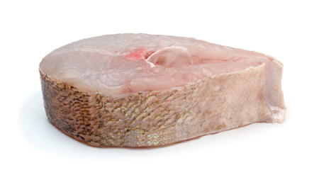 Fresh raw river fish steak isolated on white.