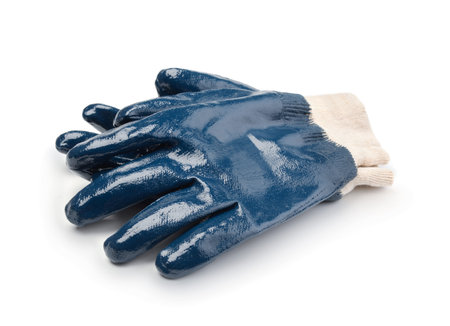 A pair of blue industrial gloves isolated on white.