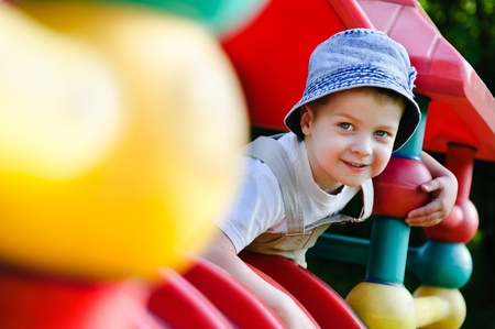 Little boy on playgroundの写真素材