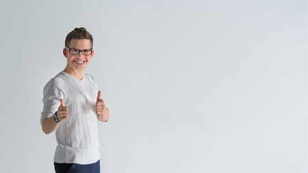 Happy boyfriend show sight thumbs up and good luckの写真素材