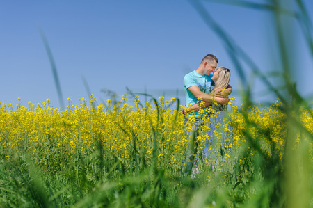 Portrait of young beautiful couple kissingの写真素材
