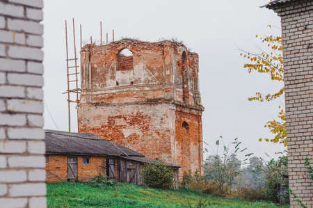 Destroyed building. View of the village Druya, Belarus. Autumn nasty dayの写真素材