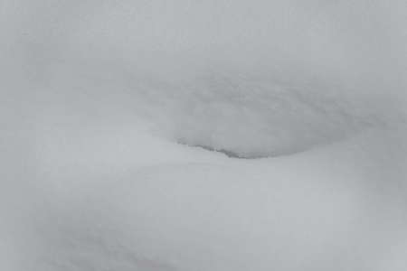 Background. Snow white close-up. snowdrift after snowfallsの写真素材