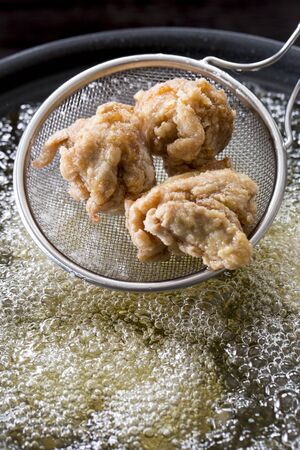 Cooking Fried Chickenの写真素材