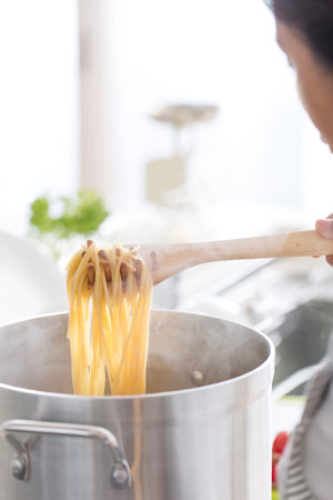 Cooking scenery of pasta, cooking in the kitchenの写真素材