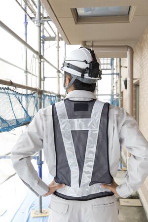 Back view of construction workersの写真素材