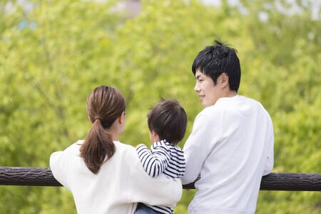 Young Japanese Family, Back Viewの写真素材