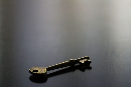 Still life of antique brass keyの写真素材
