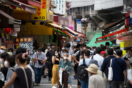 July 11, 2020 Ameyoko Shopping Street is famous in Tokyo. People in Tokyo wearing surgical mask and shopping in a shopping district where tourists have decreased due to "COVID-19"のeditorial素材