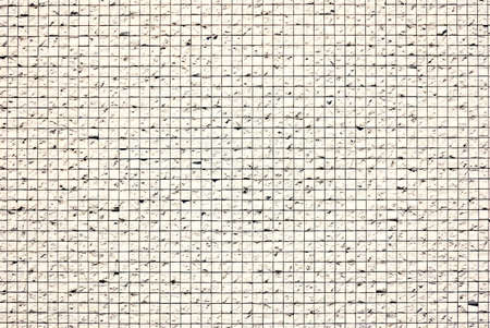 Photo of a wall decorated with white cube stone as a background materialの写真素材