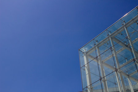 Clear blue sky and glass buildingsの写真素材