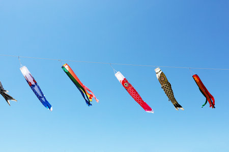 A blue clear sky and a Carp streamer swaying in the windの写真素材
