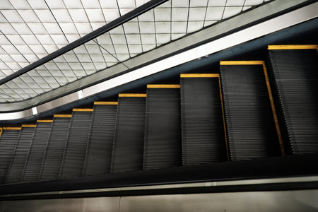 A high-angle close-up of an empty escalatorの写真素材