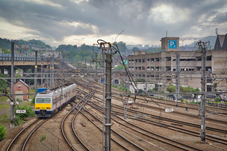 Liege, Belgium, June 2021: Belgian NMBS SNCB passenger train leaving the station of Liege Guillemins...