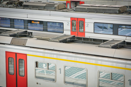 Liege, Belgium, June 2021: Belgian NMBS SNCB railroad trains in a train station. Close-up and...