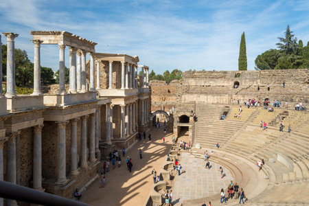 Merida, Spain, April 2017, tourists visiting the Roman ruins theatre arena & waiting rooms used for gladiator & animal fights. Travel and tourism.のeditorial素材