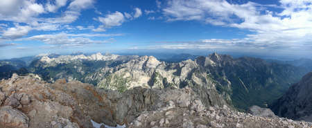 Triglav summit panorama view on surrounding mountain range of Triglav National Park in Slovenia. Travel and tourismの写真素材
