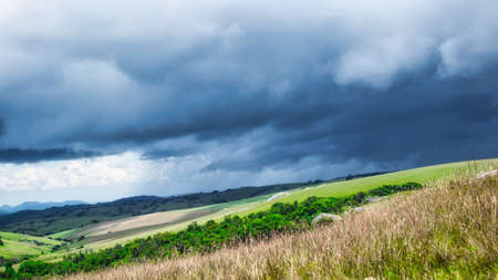 Storm and rain clouds over Nyika national park in Malawi, Africa. Beauty in natureの写真素材