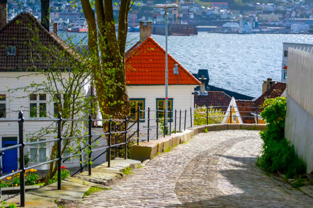 Bergen, Norway, May 2015: Cozy cobblestoned street in the historical center of Bergen, Norwayのeditorial素材