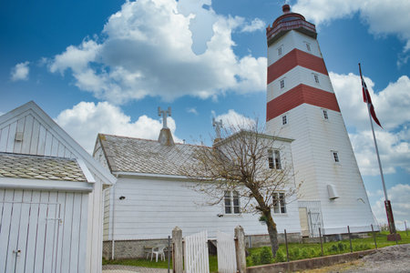 Alnes, Norway, May 2015: View on the wooden lighthouse and building of Alnes in Godoya, Norwayのeditorial素材
