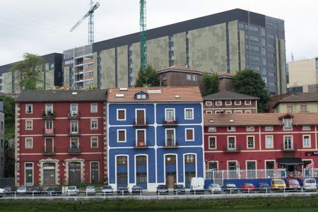 Bilbao, Spain, May 2012: colorful houses on the riverbank of the city of Bilbao, old harbor areaのeditorial素材