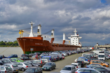 Antwerp, Belgium, May 2012: Qamutik cargo ship or vessel moored on the quay in the city of Antwerp, Belgium.のeditorial素材