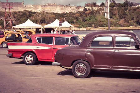 Havana, Cuba, February 2011: oldtimer Cuban cars parked on a parking lot in Havana, Cubaのeditorial素材