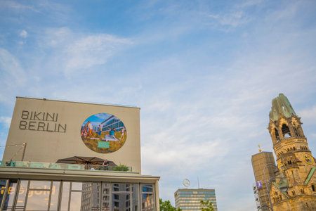 Berlin, Germany, June 2022, Illustrative Editorial: View on Bikini Berlin Shopping Mall and Kapelle der Kaiser-Wilhelm-Gedachtniskircheのeditorial素材