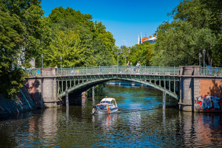 Berlin, Germany, June 2022: View on the Admiralbrucke bridge over the Landwehr canal on the border of Neukolln and Kreuzberg in Berlinのeditorial素材