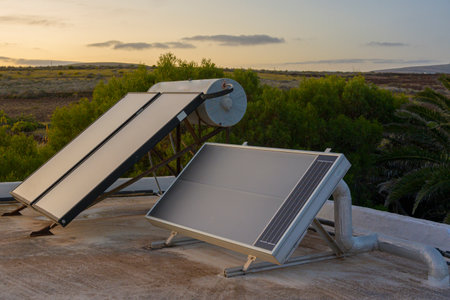 Solar water heating system installed on a residential rooftopの写真素材