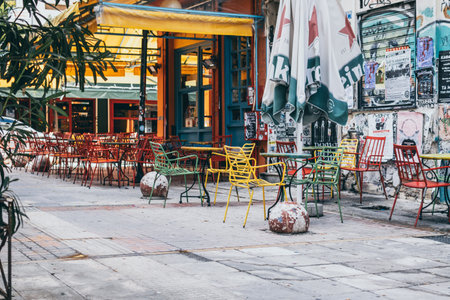 Athens, Greece, November 26th: View on colorful and cozy outdoor bar at Exarcheia anarchist city...