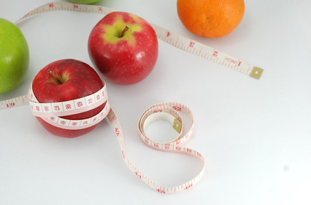 Apple,Fruit concept diet on a wooden floor.の写真素材
