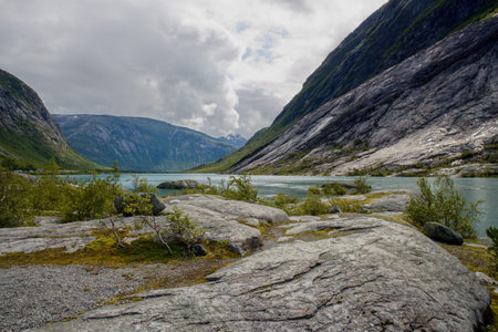 View of Nigardsbrevatnet lake surrounded by mountains - Jostedalsbreen national park, Norway