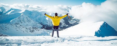 A man spreading his arms. Success conceptの写真素材